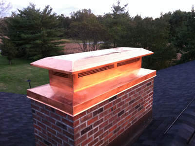 Before and after chimney cap replacement in Uniondale, NY